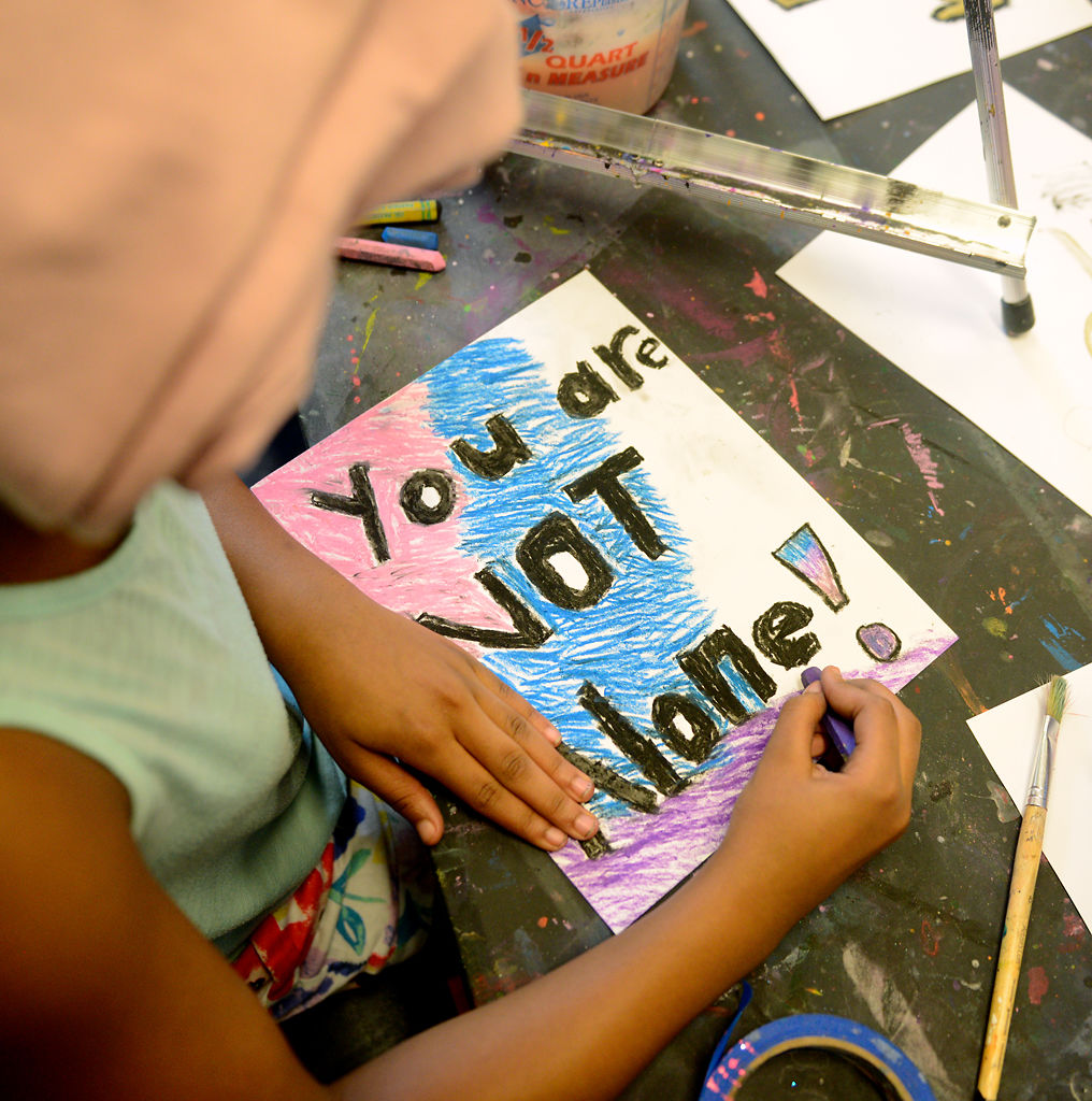 A poster being drawn for the Mental Health Fair art contest